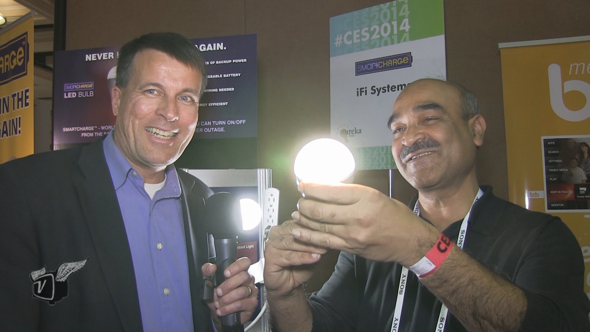 A demonstration of the SmartCharge LED battery backed-up, light bulb at CES 2014.